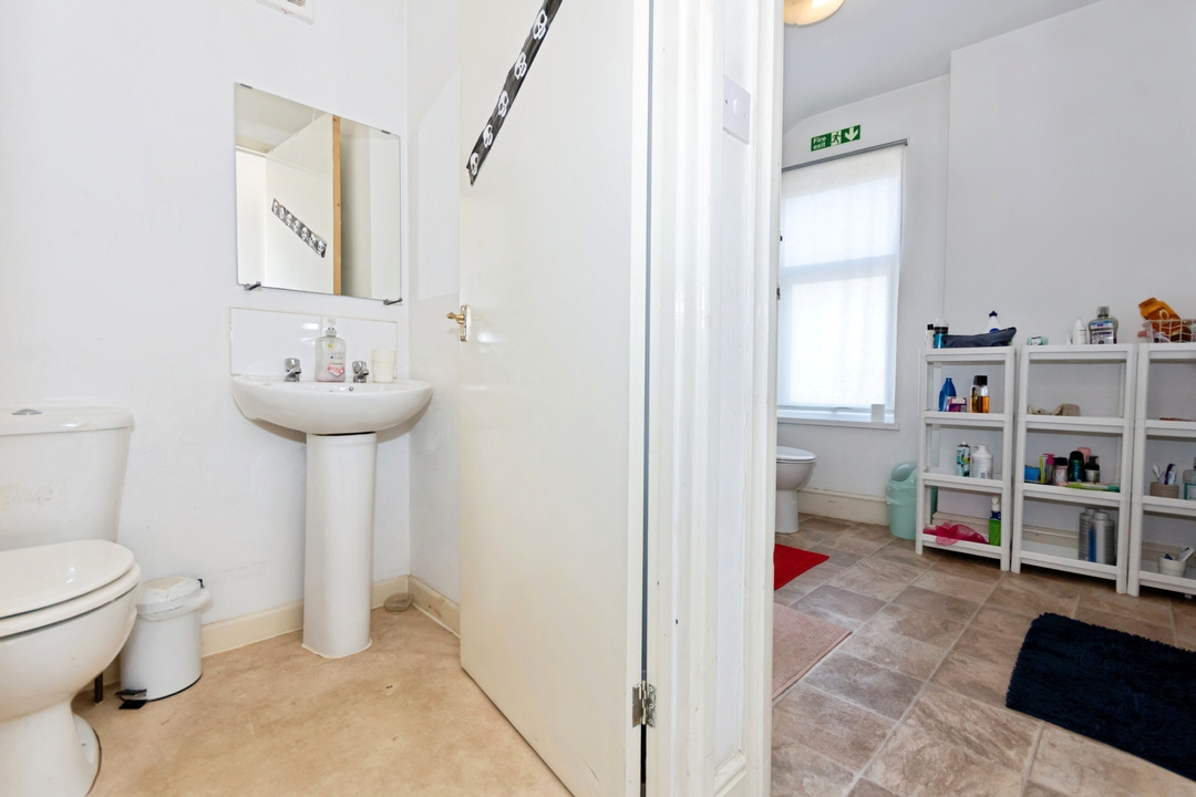 Main shower and separate toilet